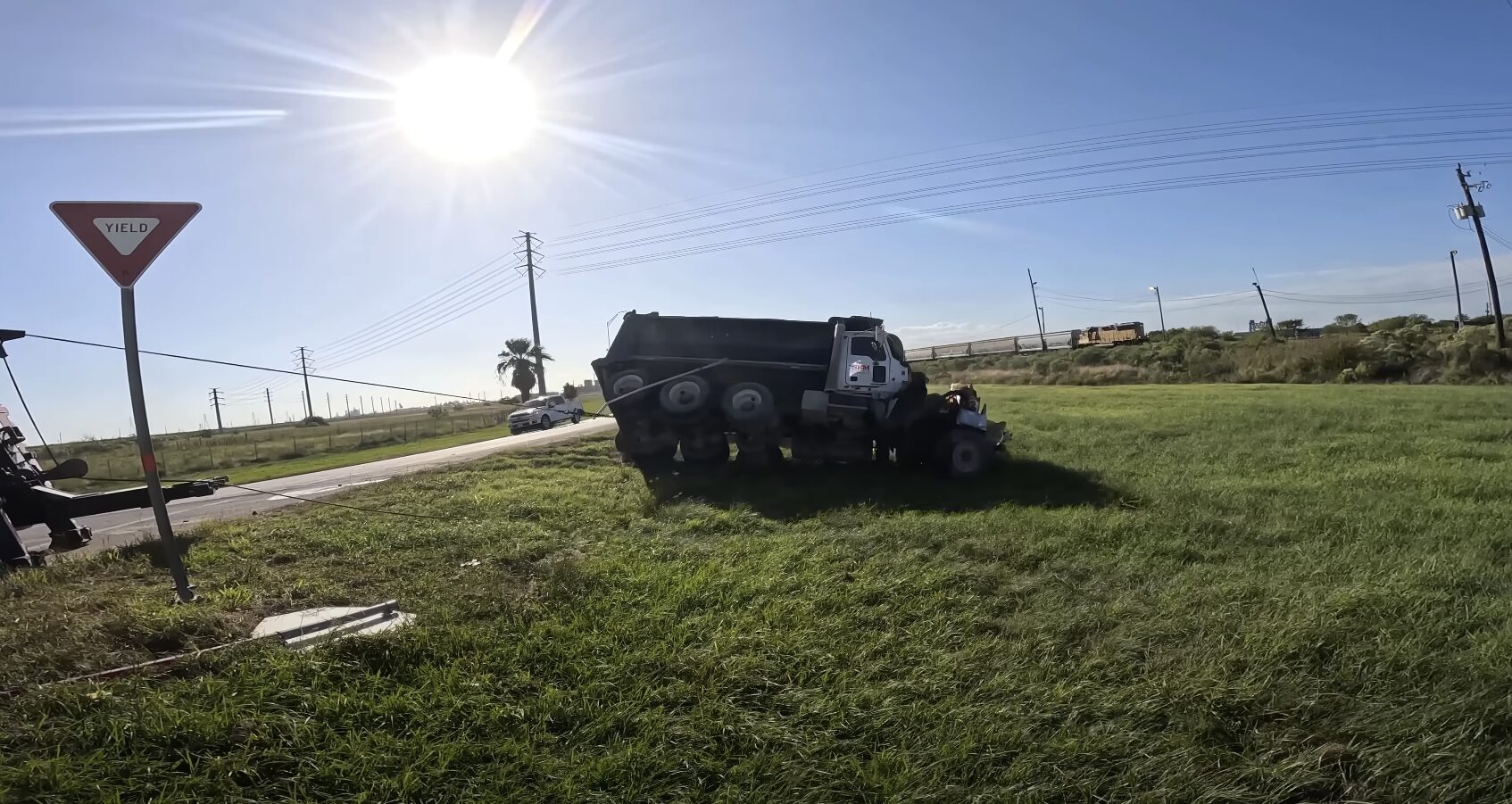 Professional tow truck operator providing emergency roadside assistance