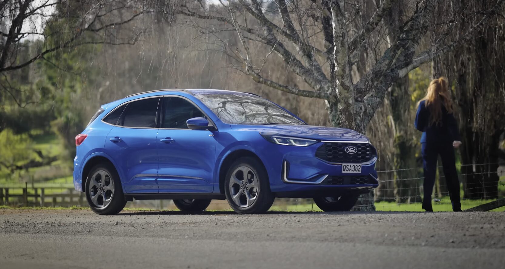 Safe roadside waiting practices while tow truck responds Vehicle stranded on roadside waiting for professional towing assistance